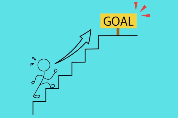 Person-climbing-the-stairs-to-the-goal